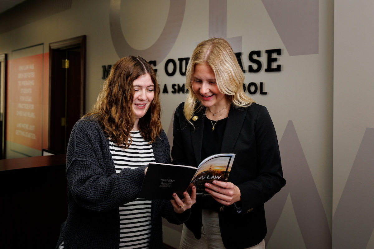 Admissions counselor with student