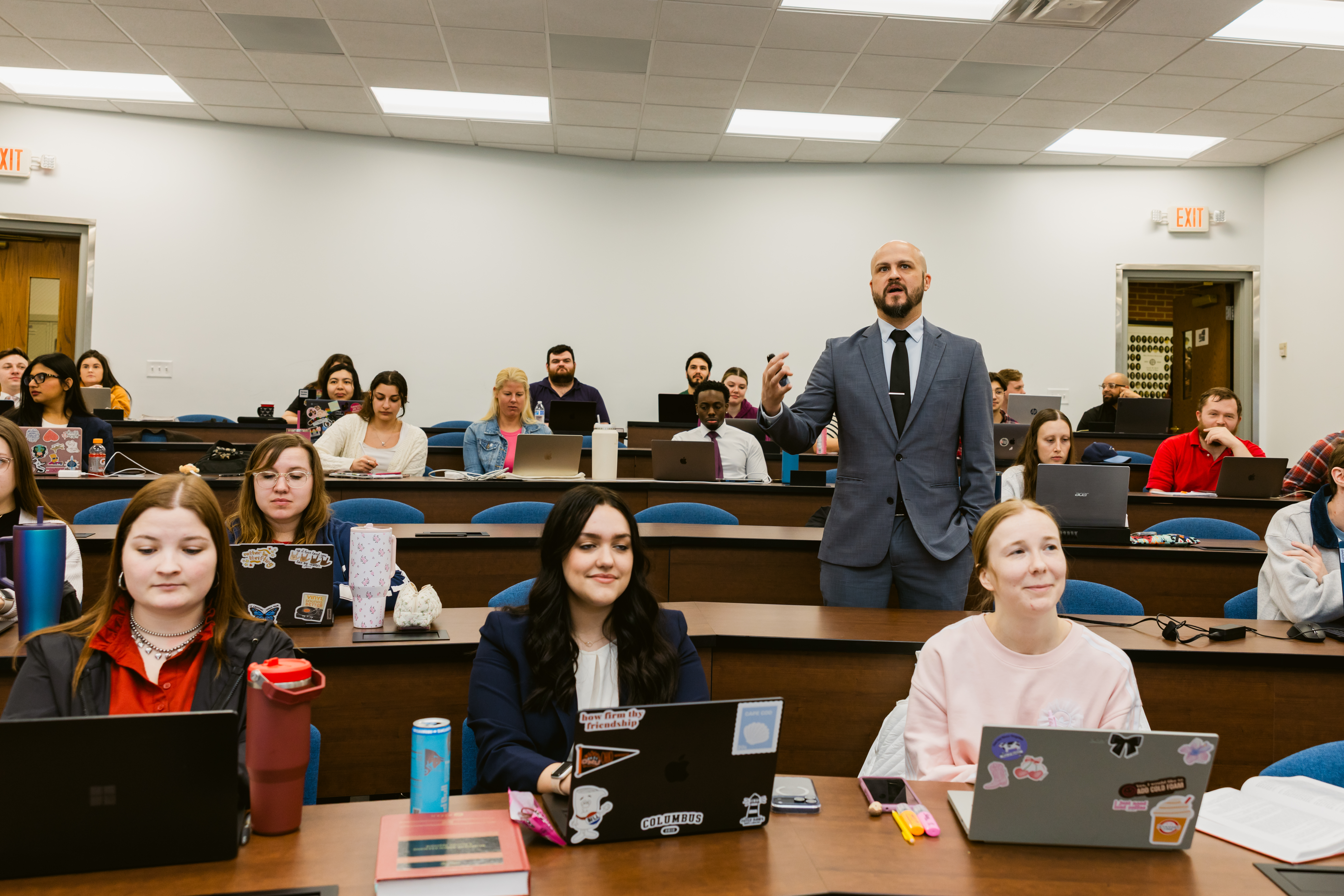 Professor teaching students in classroom