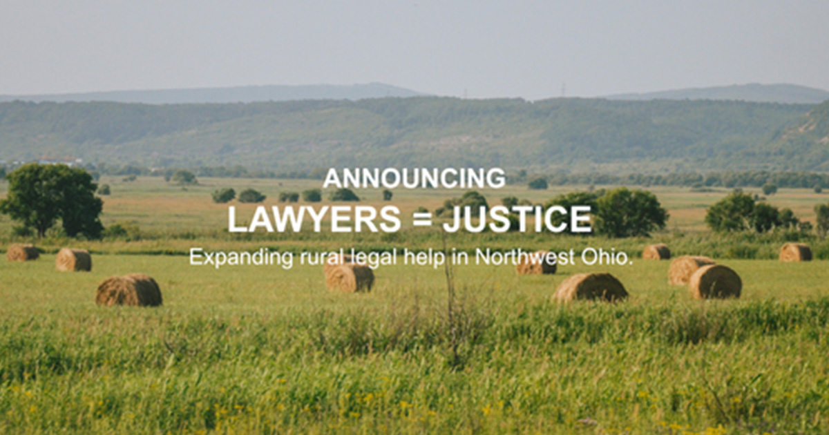 Field with Hay Rolled up with text of 'Lawyers = Justice' over laying it