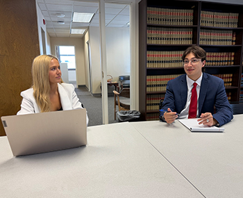 A law student providing legal assistance to clients through the Rural Practice Clinic.